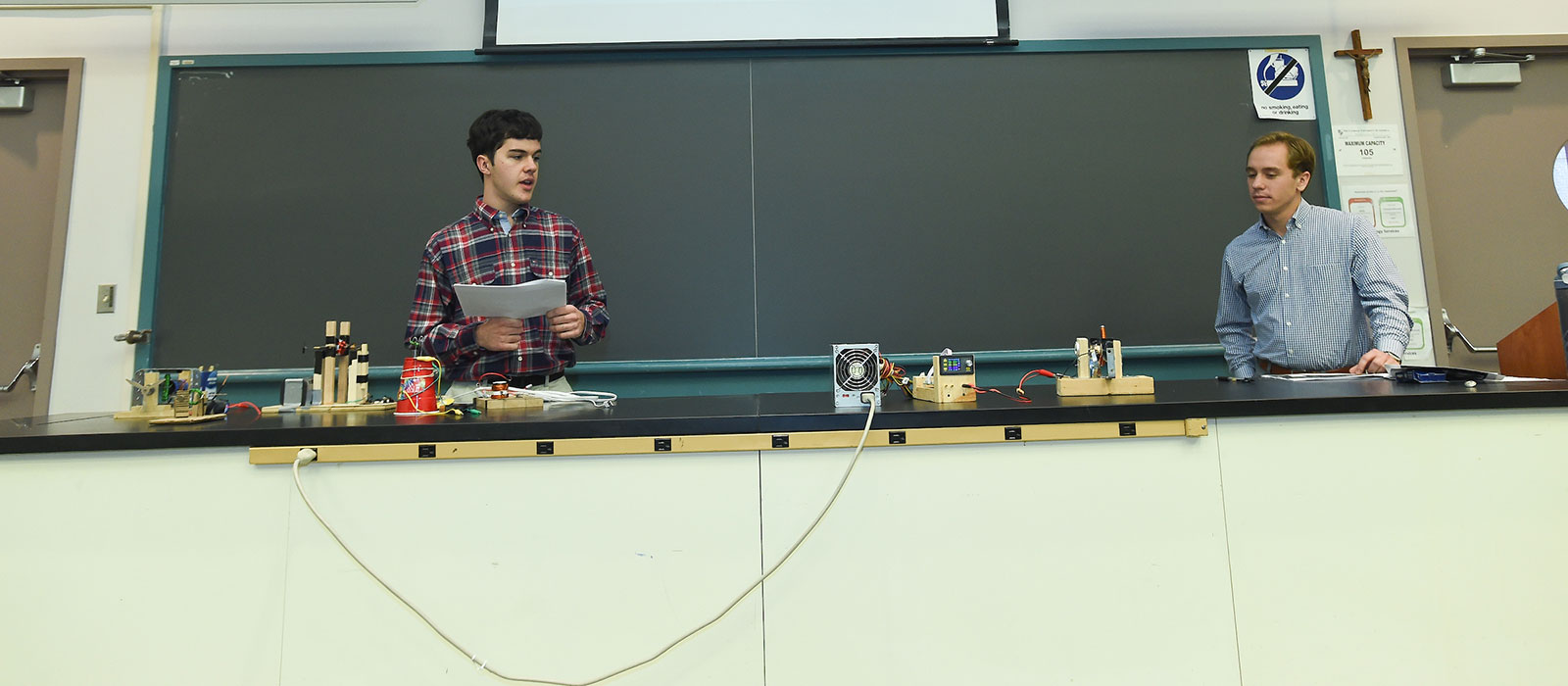 Physics students presenting in class